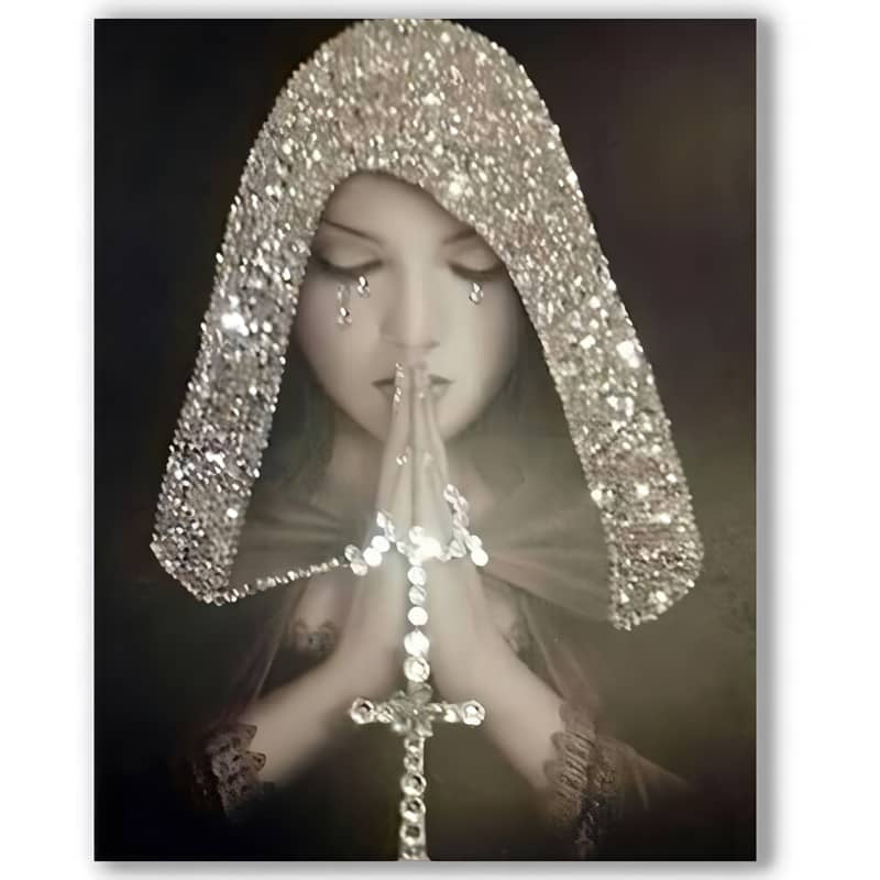Woman in glittering hood praying with a cross, symbolic of faith and devotion