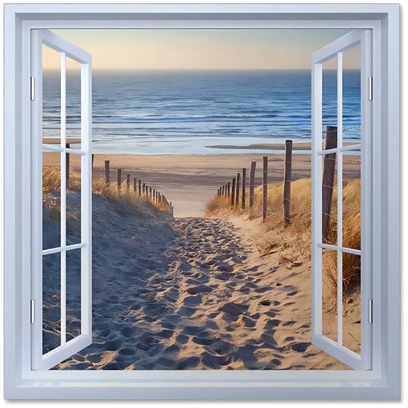Open window view of sandy path leading to peaceful beach with ocean waves in the background