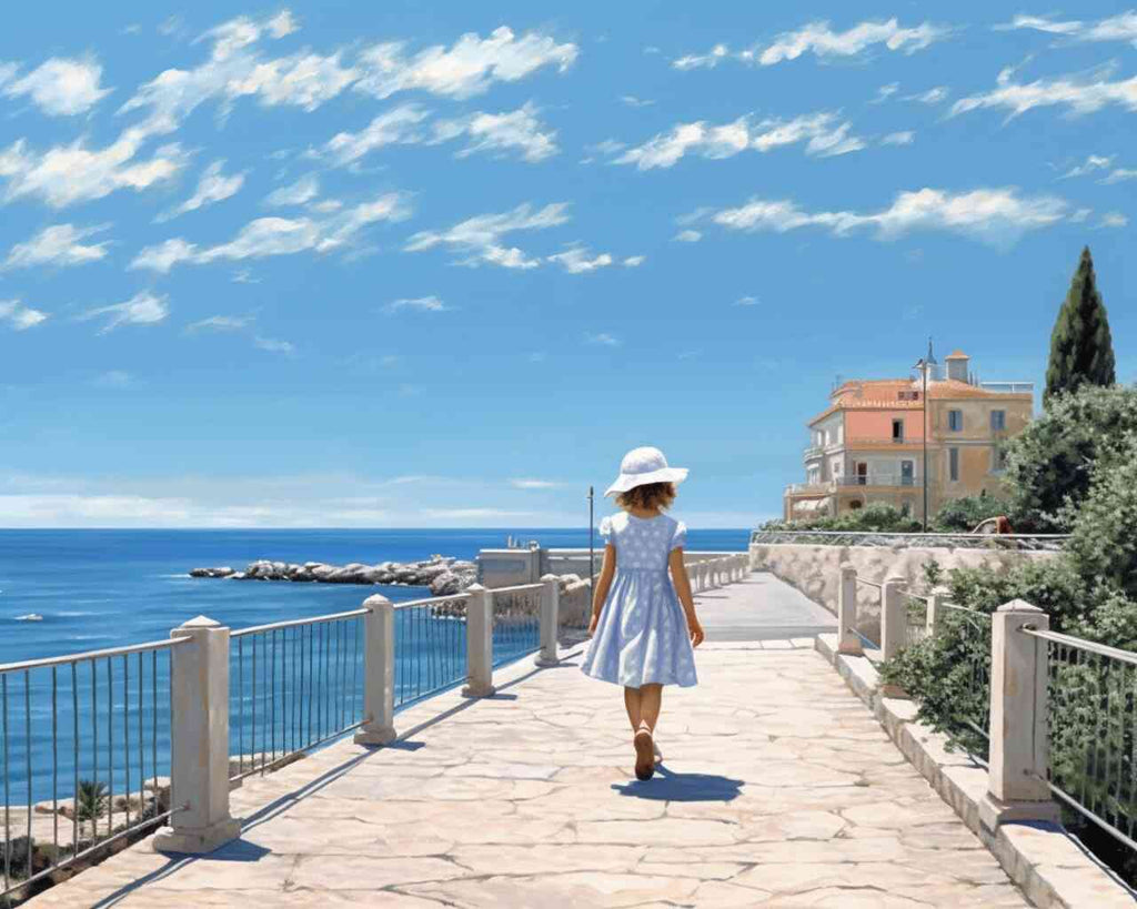 DIY Diamond Painting - Coastal Whispers with girl in blue dress and white hat walking on sunlit path by the Mediterranean Sea and orange house