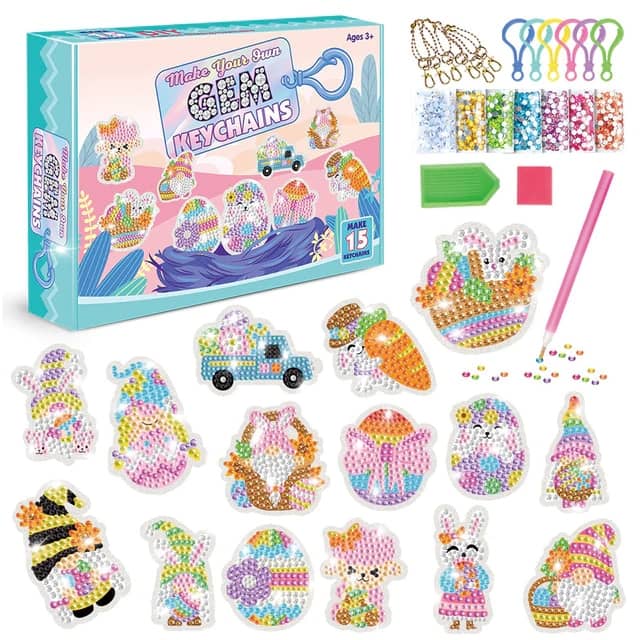 Diamond painting keychain kit featuring Easter bunny design, 15 colorful gem key rings, craft supplies, and tools in a box.