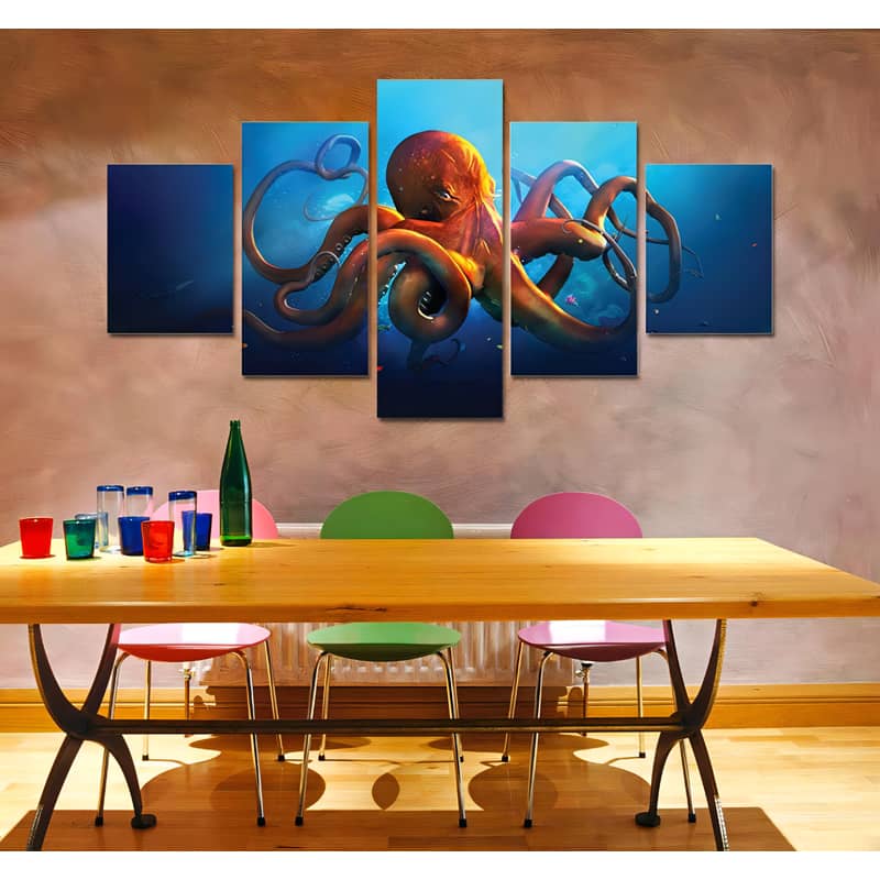 Diamond painting of octopus in five pieces displayed on wall above dining table with vibrant colored chairs and glassware.