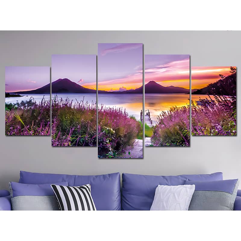 Diamond Painting 5 parts - Lavender field at mountain lake with sunset view on a wall above a purple couch.