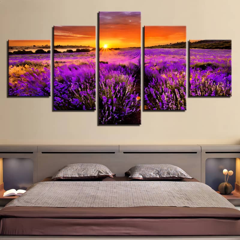Diamond painting of a lavender field in violet with a stunning sunset, displayed on a bedroom wall in five pieces.