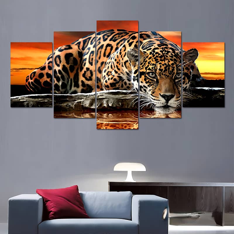 Diamond painting of a lying leopard in front of a sunset, displayed as a 5-piece wall art set.