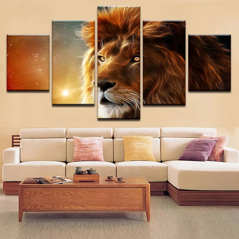 Diamond painting of a majestic lion with a shimmering mane at sunset, split into 5 parts, hung above a modern sofa.