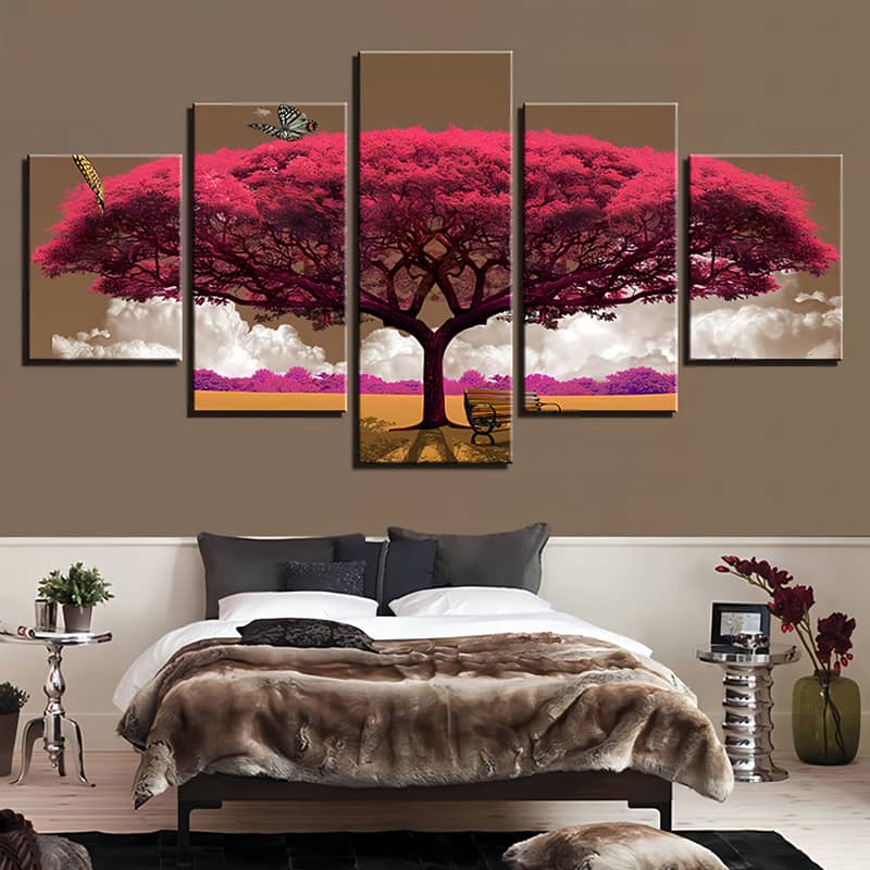 Diamond painting art with 5 panels displaying a pink tree and bench in the shade, above a contemporary bedroom setup