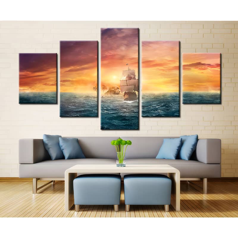 Diamond Painting 5 parts showing a ship sailing towards an island at sunset, perfect decor for living rooms.