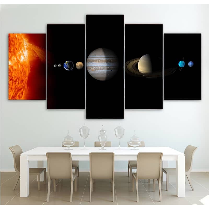 Diamond painting 5-piece wall art of our solar system displayed above a dining table, showcasing planets from the sun to Neptune